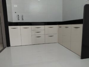 Modular kitchen in 2 BHK flat at Lagos Homes Pune